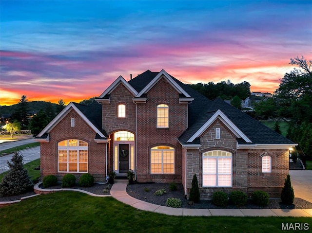 500 Overlook Terrace Court, Eureka, MO 63025 - traditional home featuring a front yard, brick siding, and stone siding