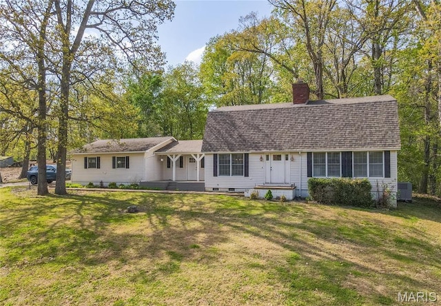 16747 Chalk Bluff Trl, Dexter, MO 63841 - dutch colonial with a chimney, a front yard, roof with shingles, and central AC unit