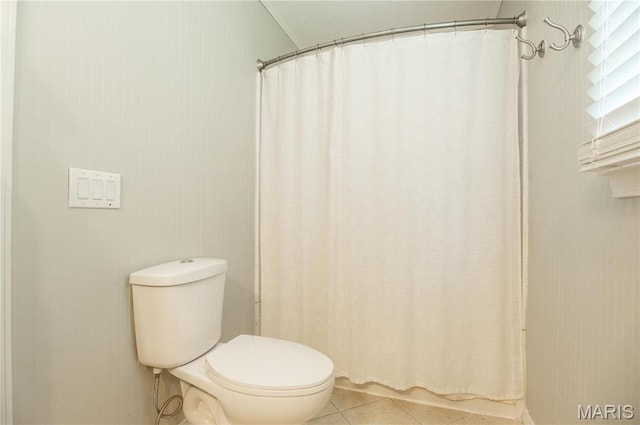 16747 Chalk Bluff Trl, Dexter, MO 63841 - bathroom featuring tile patterned floors, toilet, and a shower with shower curtain