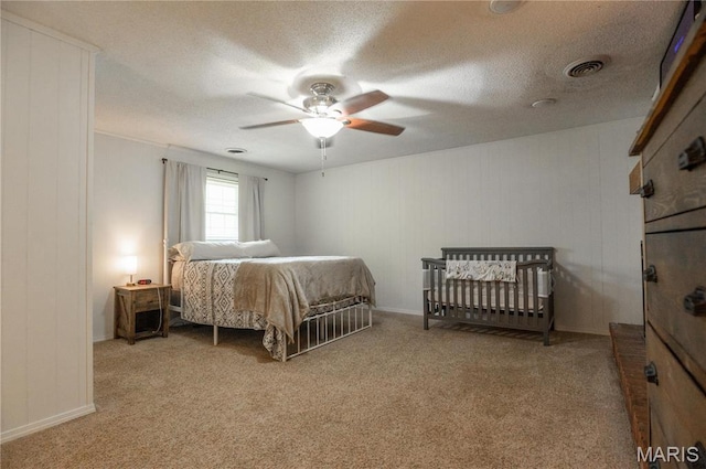 16747 Chalk Bluff Trl, Dexter, MO 63841 - carpeted bedroom featuring ceiling fan and a textured ceiling