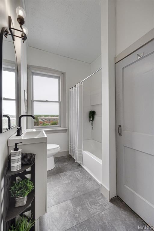 full bath featuring toilet, shower / bath combination with curtain, and vanity