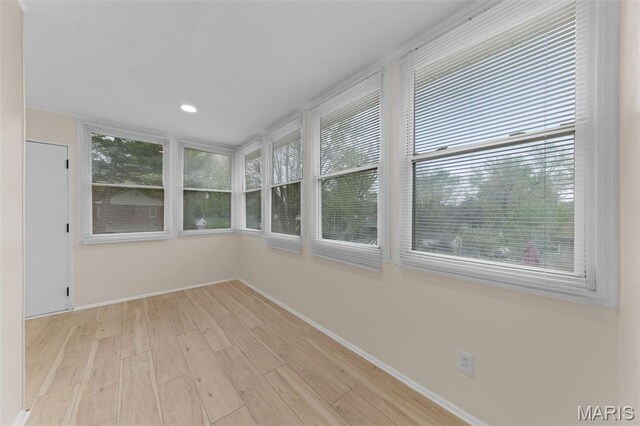 236 Georgia Ave, Saint Louis, MO 63135 - unfurnished sunroom featuring wood finished floors, baseboards, and recessed lighting
