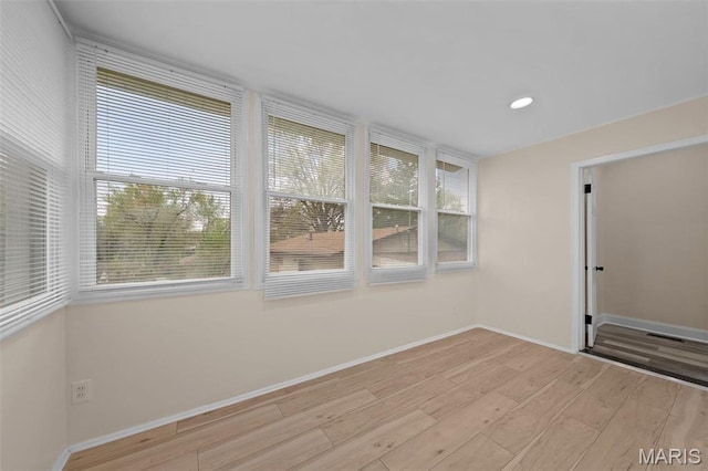 236 Georgia Ave, Saint Louis, MO 63135 - unfurnished room featuring light wood-style flooring, baseboards, and recessed lighting