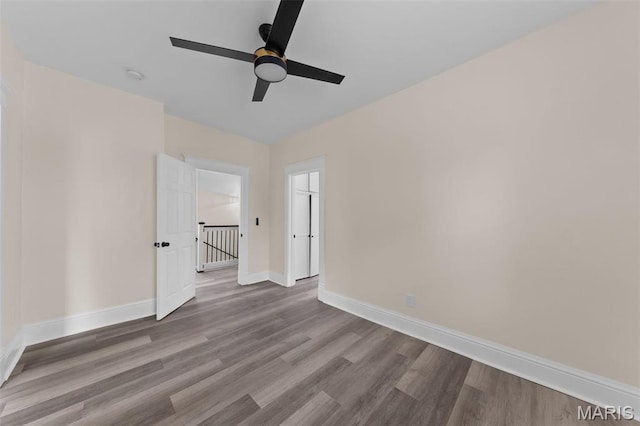 236 Georgia Ave, Saint Louis, MO 63135 - empty room featuring baseboards, wood finished floors, and ceiling fan