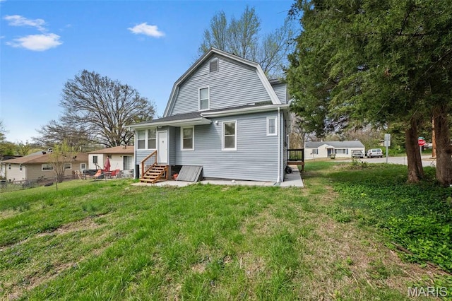 236 Georgia Ave, Saint Louis, MO 63135 - back of property with entry steps and a gambrel roof