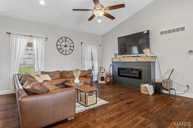 105 Shepherd Mountain Rd, Farmington, MO 63640 - living room with ceiling fan, wood finished floors, a glass covered fireplace, baseboards, and high vaulted ceiling
