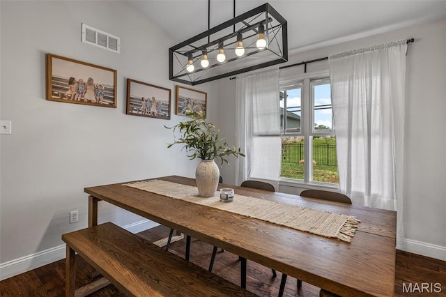 105 Shepherd Mountain Rd, Farmington, MO 63640 - dining room featuring baseboards, healthy amount of natural light, wood finished floors, and lofted ceiling