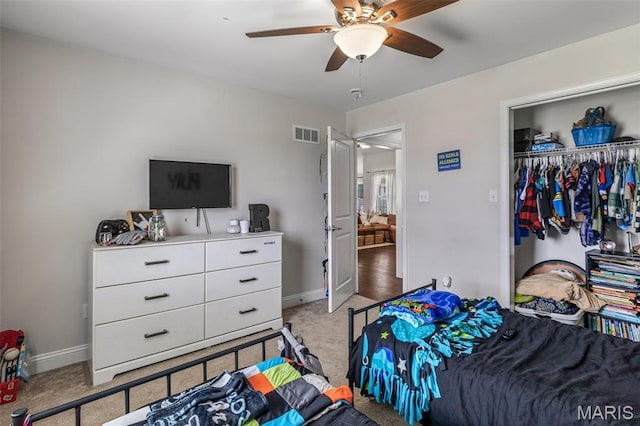 105 Shepherd Mountain Rd, Farmington, MO 63640 - bedroom with light carpet, baseboards, a closet, and a ceiling fan