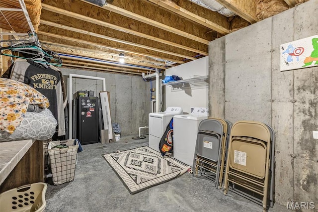 105 Shepherd Mountain Rd, Farmington, MO 63640 - unfinished basement featuring washing machine and clothes dryer