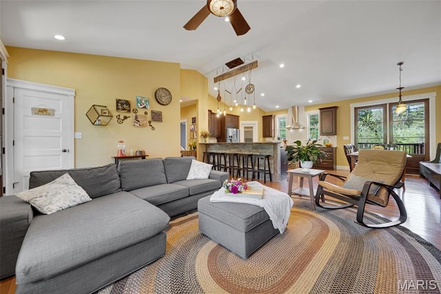 409 Pawnee Dr, Irondale, MO 63648 - living area with a ceiling fan, vaulted ceiling, light wood-style flooring, and recessed lighting