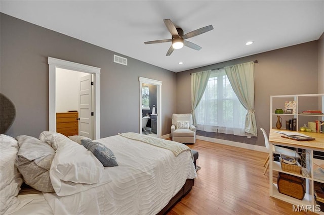409 Pawnee Dr, Irondale, MO 63648 - bedroom with wood finished floors, baseboards, recessed lighting, connected bathroom, and a ceiling fan