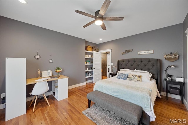 409 Pawnee Dr, Irondale, MO 63648 - bedroom featuring an office area, baseboards, wood finished floors, and recessed lighting