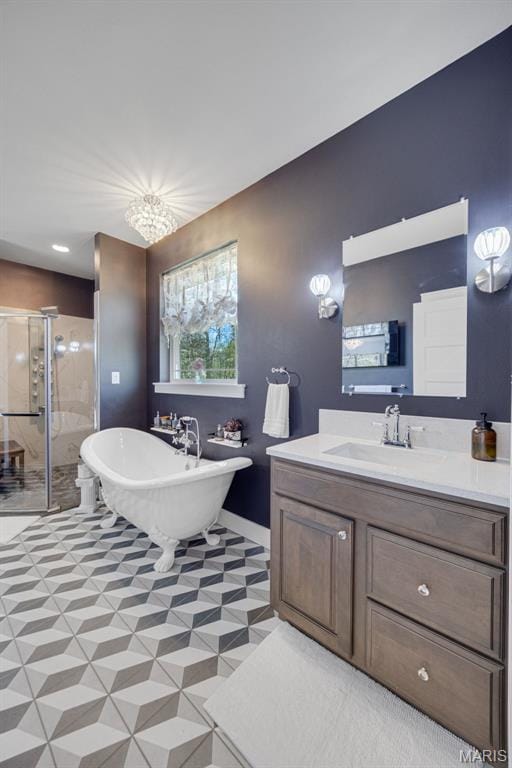 409 Pawnee Dr, Irondale, MO 63648 - full bath featuring a stall shower, vanity, and a soaking tub