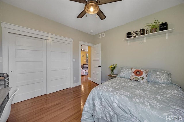 409 Pawnee Dr, Irondale, MO 63648 - bedroom with wood finished floors, a closet, ceiling fan, and baseboards