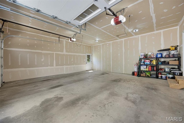 409 Pawnee Dr, Irondale, MO 63648 - garage featuring a garage door opener