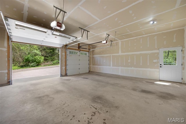 409 Pawnee Dr, Irondale, MO 63648 - garage featuring a garage door opener