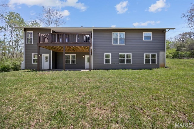 409 Pawnee Dr, Irondale, MO 63648 - rear view of property with a wooden deck and a lawn