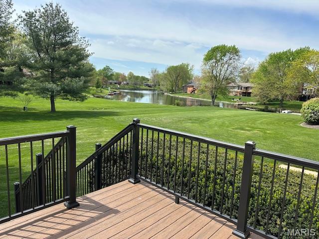 14 Sierra Dr, Glen Carbon, IL 62034 - wooden deck with a water view and a yard