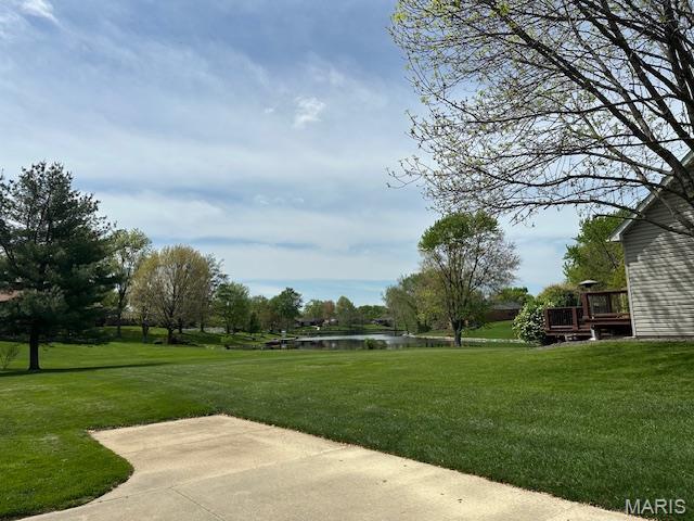 14 Sierra Dr, Glen Carbon, IL 62034 - view of grassy yard featuring a water view