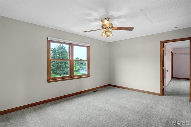 14 Sierra Dr, Glen Carbon, IL 62034 - spare room featuring carpet, ceiling fan, and baseboards
