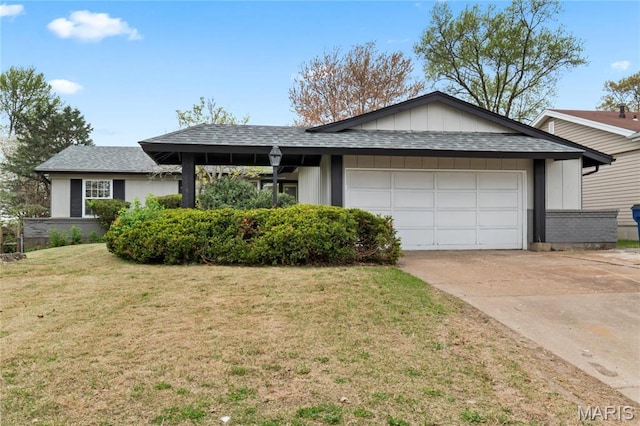 11735 Old Halls Ferry Rd, Florissant, MO 63033 - ranch-style house with a garage, a front yard, concrete driveway, and a shingled roof
