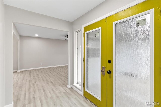 11735 Old Halls Ferry Rd, Florissant, MO 63033 - entrance foyer featuring wood finished floors, baseboards, and ceiling fan