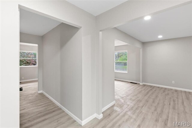 11735 Old Halls Ferry Rd, Florissant, MO 63033 - hall with wood finished floors, baseboards, and recessed lighting