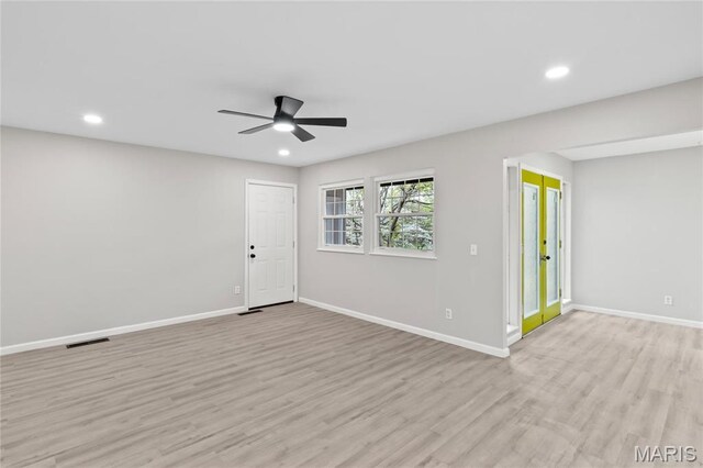 11735 Old Halls Ferry Rd, Florissant, MO 63033 - unfurnished room featuring baseboards, light wood-style flooring, ceiling fan, and recessed lighting