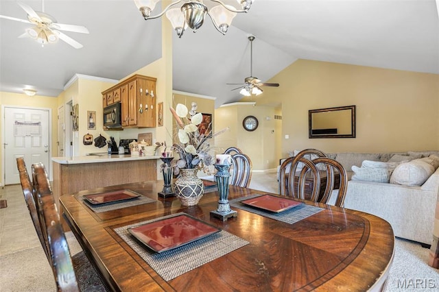 601 John David Dr, Farmington, MO 63640 - dining room featuring a ceiling fan, vaulted ceiling, baseboards, and a chandelier
