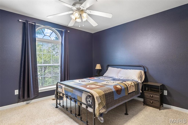 601 John David Dr, Farmington, MO 63640 - carpeted bedroom featuring multiple windows, baseboards, and ceiling fan