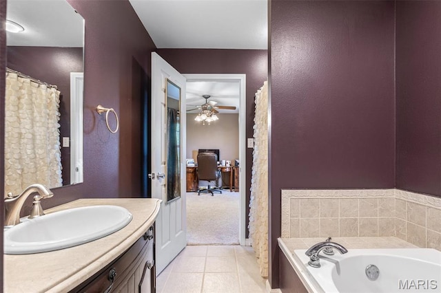 601 John David Dr, Farmington, MO 63640 - full bath featuring vanity, a bath, a ceiling fan, and tile patterned floors