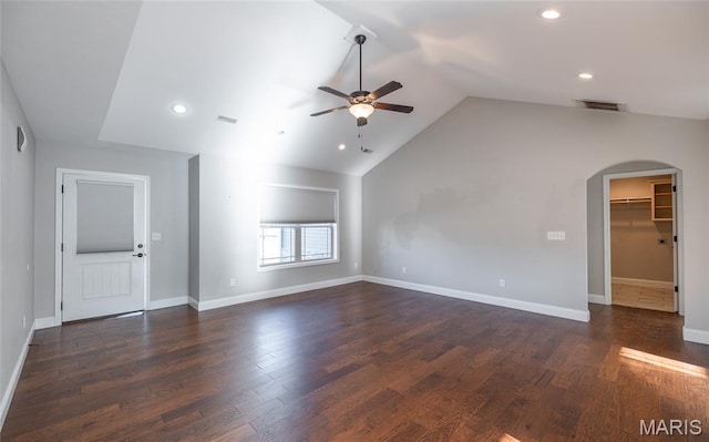 11175 Lexington Ln, Rolla, MO 65401 - unfurnished living room with ceiling fan, arched walkways, vaulted ceiling, recessed lighting, and wood finished floors