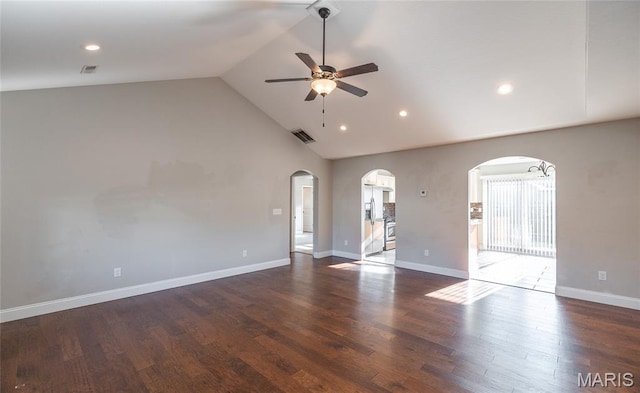 11175 Lexington Ln, Rolla, MO 65401 - unfurnished living room with arched walkways, a ceiling fan, plenty of natural light, wood finished floors, and high vaulted ceiling