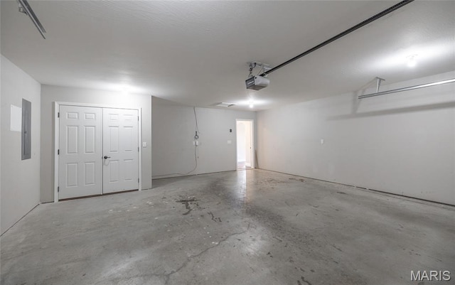 11175 Lexington Ln, Rolla, MO 65401 - garage with electric panel and a garage door opener