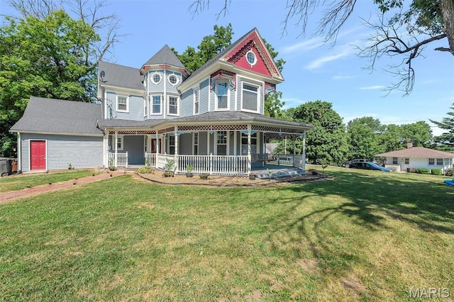 100 Lewis St, Troy, MO 63379 - view of front of property featuring a porch and a front lawn