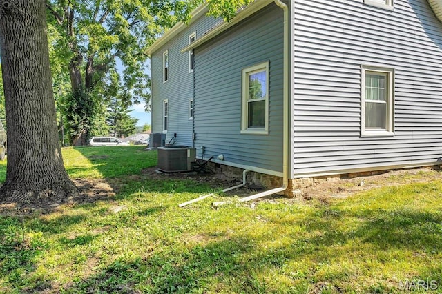 100 Lewis St, Troy, MO 63379 - view of home's exterior featuring central AC unit and a yard