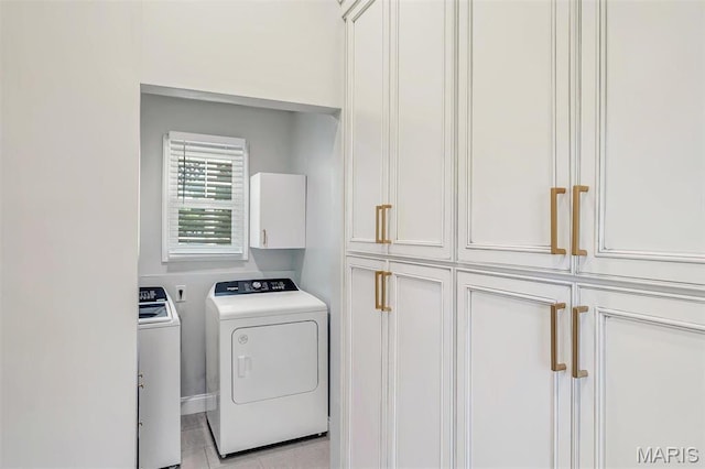 100 Lewis St, Troy, MO 63379 - laundry room with washing machine and clothes dryer and cabinet space