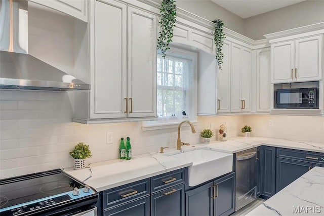 100 Lewis St, Troy, MO 63379 - kitchen with electric range, wall chimney exhaust hood, a sink, black microwave, and stainless steel dishwasher