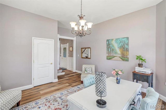 100 Lewis St, Troy, MO 63379 - dining space with light wood-style floors, a chandelier, and baseboards