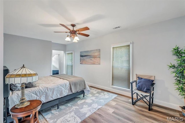 100 Lewis St, Troy, MO 63379 - bedroom featuring baseboards, wood finished floors, and ceiling fan