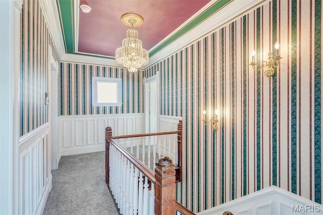 100 Lewis St, Troy, MO 63379 - corridor featuring a chandelier, an upstairs landing, a decorative wall, carpet floors, and a wainscoted wall