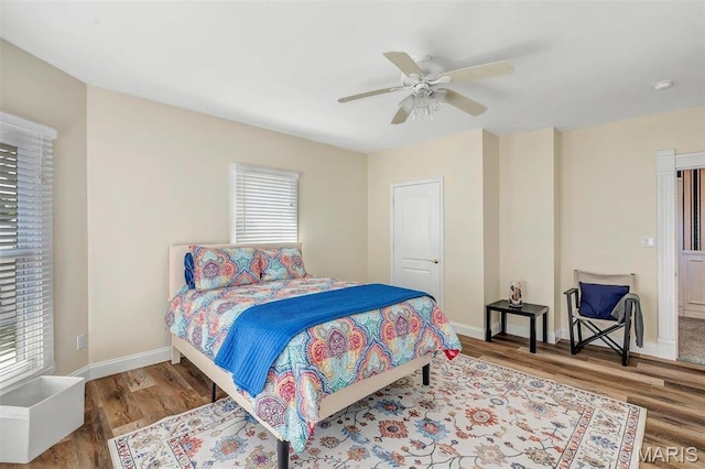 100 Lewis St, Troy, MO 63379 - bedroom with wood finished floors, baseboards, and ceiling fan