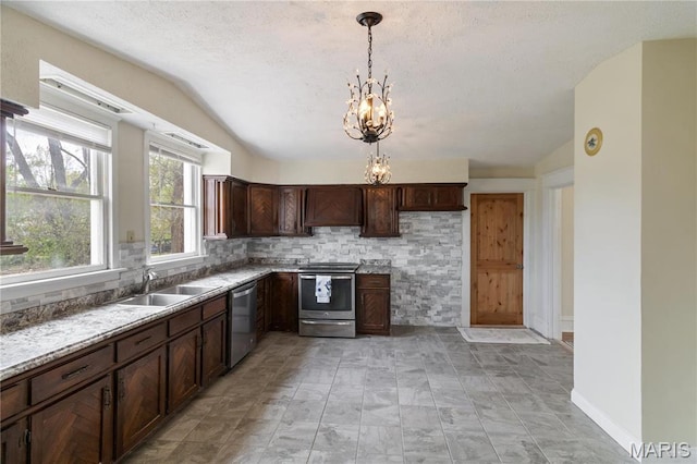 203 S B St, Bonne Terre, MO 63628 - kitchen featuring appliances with stainless steel finishes, vaulted ceiling, a sink, a chandelier, and dark brown cabinetry