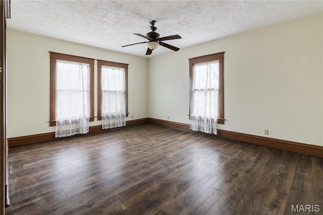 203 S B St, Bonne Terre, MO 63628 - unfurnished room featuring wood finished floors, a ceiling fan, a textured ceiling, and baseboards