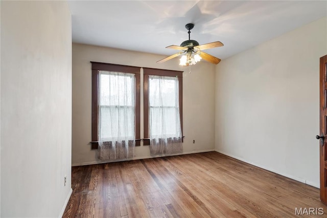203 S B St, Bonne Terre, MO 63628 - unfurnished room featuring wood finished floors, ceiling fan, and baseboards