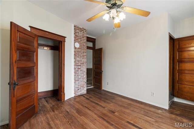 203 S B St, Bonne Terre, MO 63628 - unfurnished bedroom with dark wood-type flooring, baseboards, and a ceiling fan