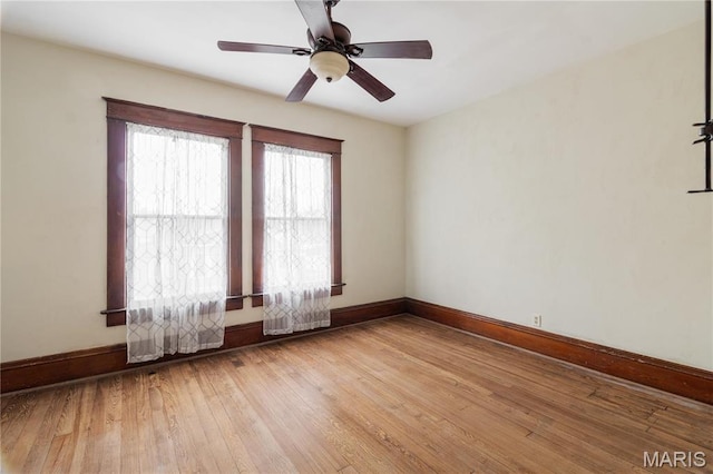 203 S B St, Bonne Terre, MO 63628 - empty room with baseboards, light wood-style flooring, and a ceiling fan