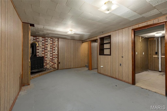 2126 Aristocrat Dr, Florissant, MO 63031 - finished below grade area featuring wood walls and a wood stove