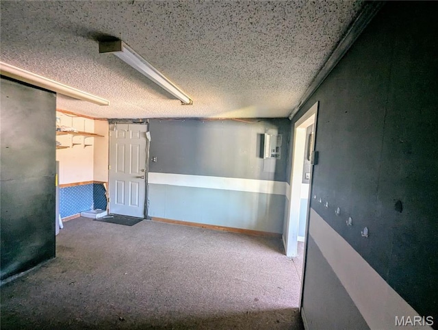 401 E Grand Ave, Campbell, MO 63933 - carpeted spare room with a textured ceiling