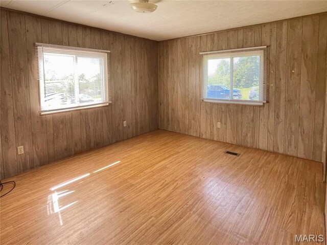 12678 Hyfield Rd, De Soto, MO 63020 - empty room with wood finished floors and wood walls